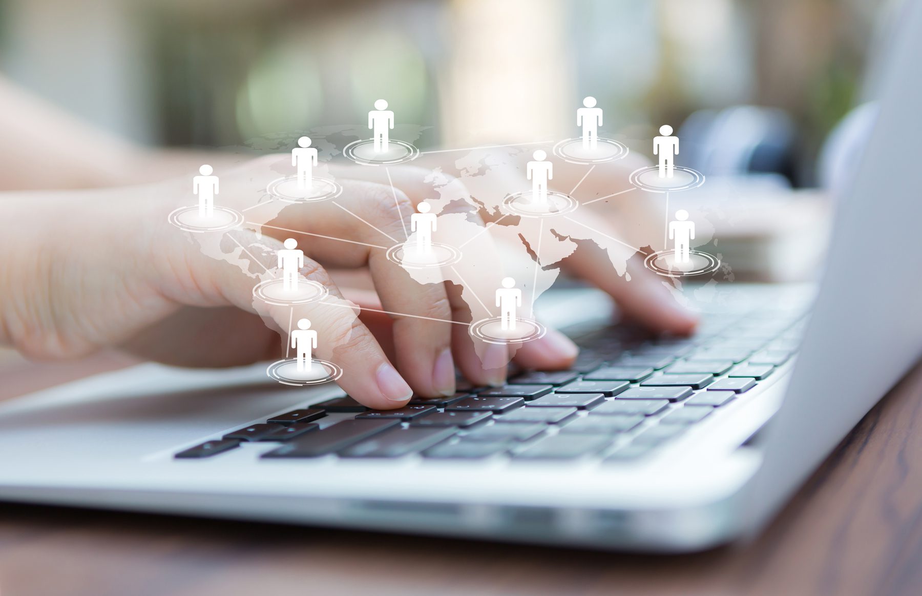 hands-with-laptop-virtual-world-map Meet Your Digital Guide